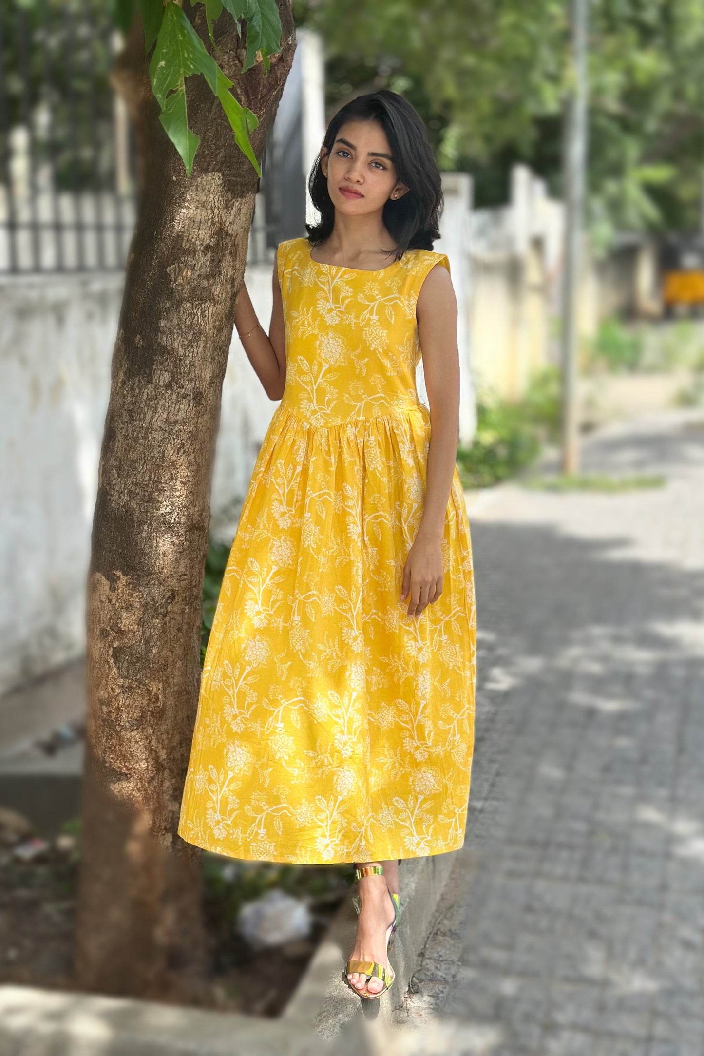 Yellow floral printed sleeveless dress